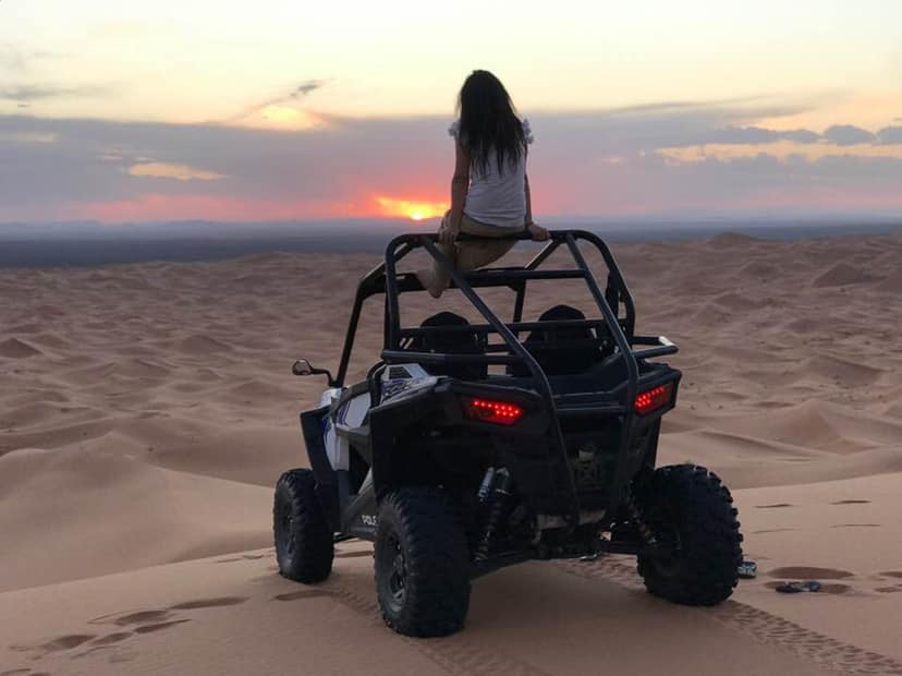 Beautiful woman from Spain enjoying the Quad ride in the Dunes of Merzouga